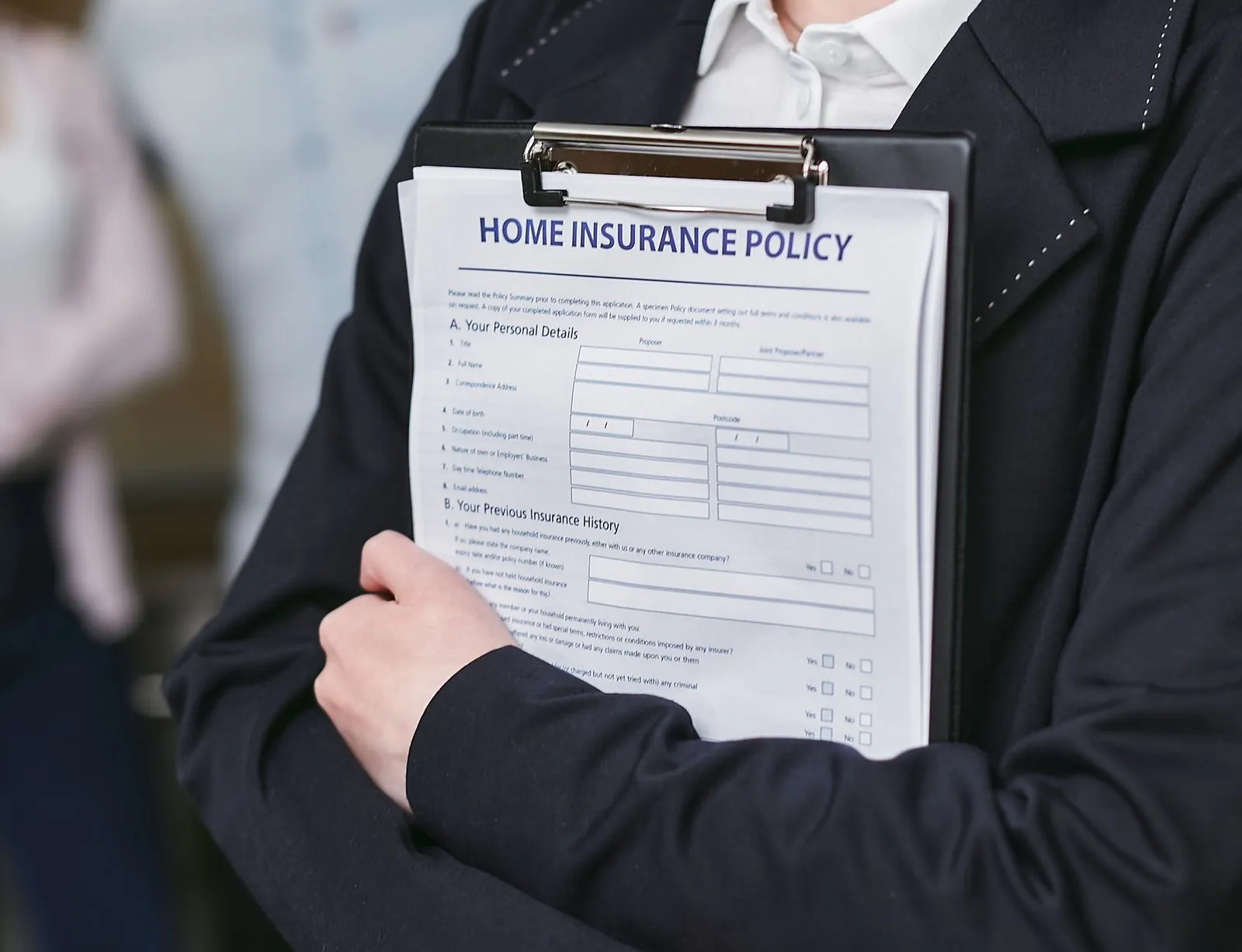 Comparison chart of travel insurance plan features and pricing on a laptop screen