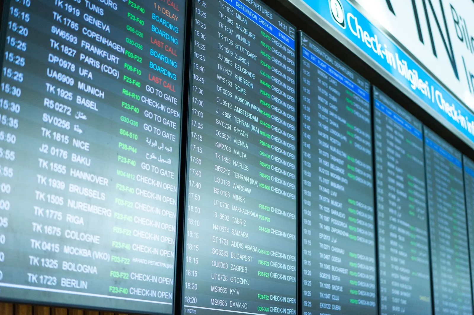 TSA security screening lane with passengers queued during a busy morning departure window